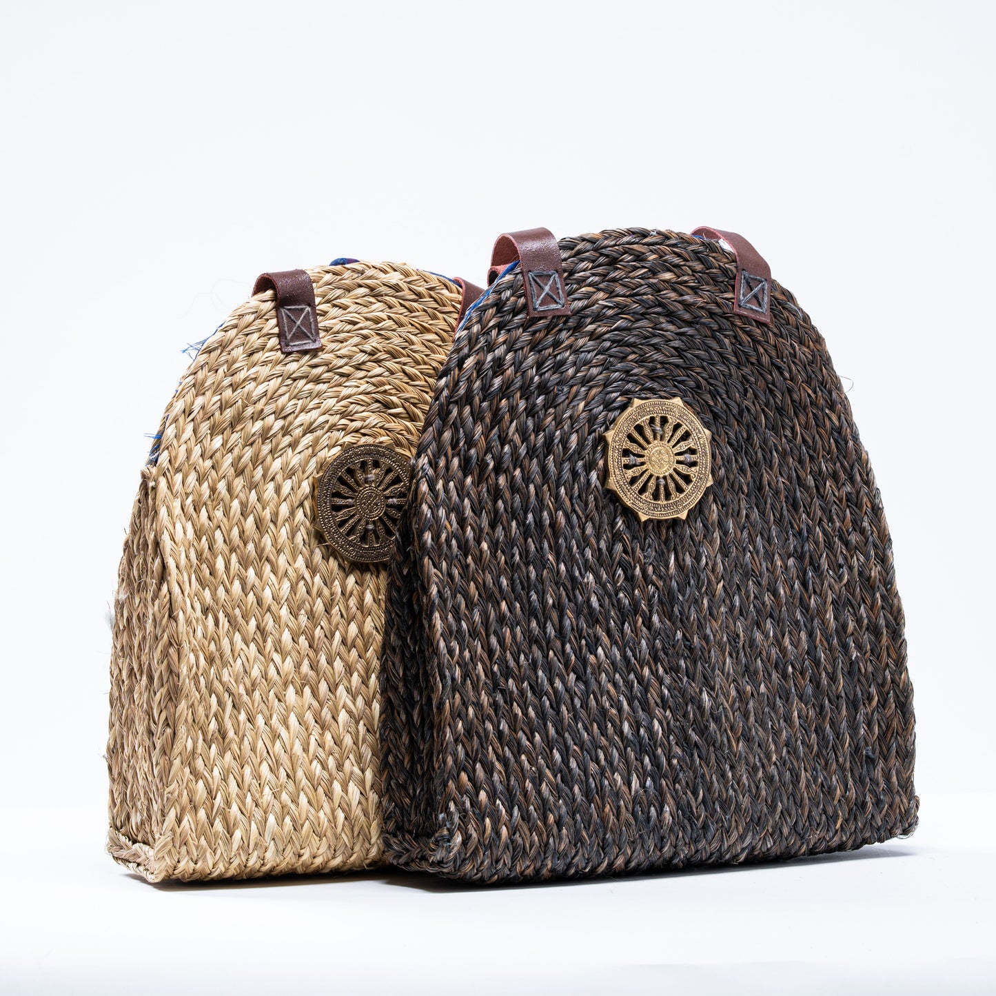 Dokra Sabai Joda Bags in natural beige and charcoal brown colors side by side, showcasing handcrafted design