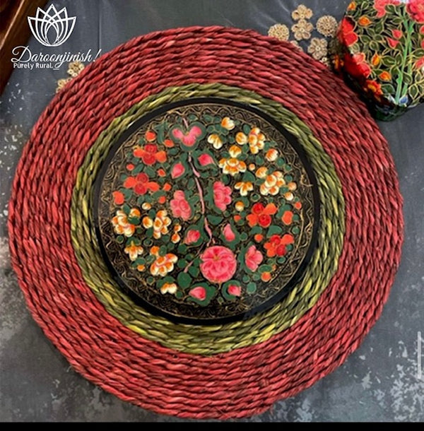 Red and green sabai grass mat with a hand-painted floral centre