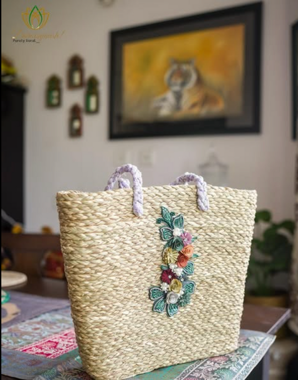 Natural sabai grass tote bag with embroidered floral detail