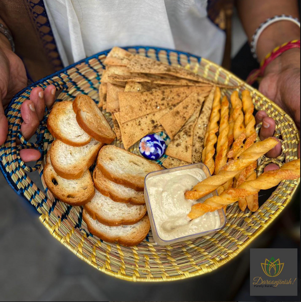 Snacks served on a round handwoven sabai grass basket tray