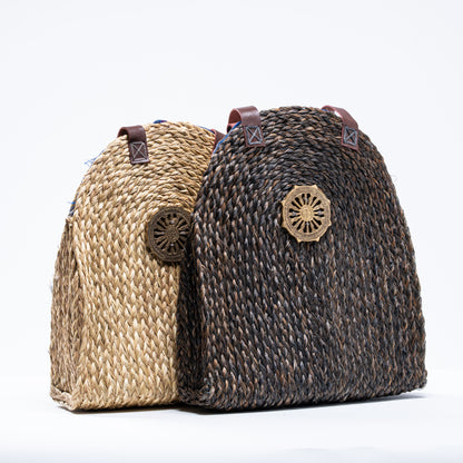 Dokra Sabai Joda Bags in natural beige and charcoal brown colors side by side, showcasing handcrafted design