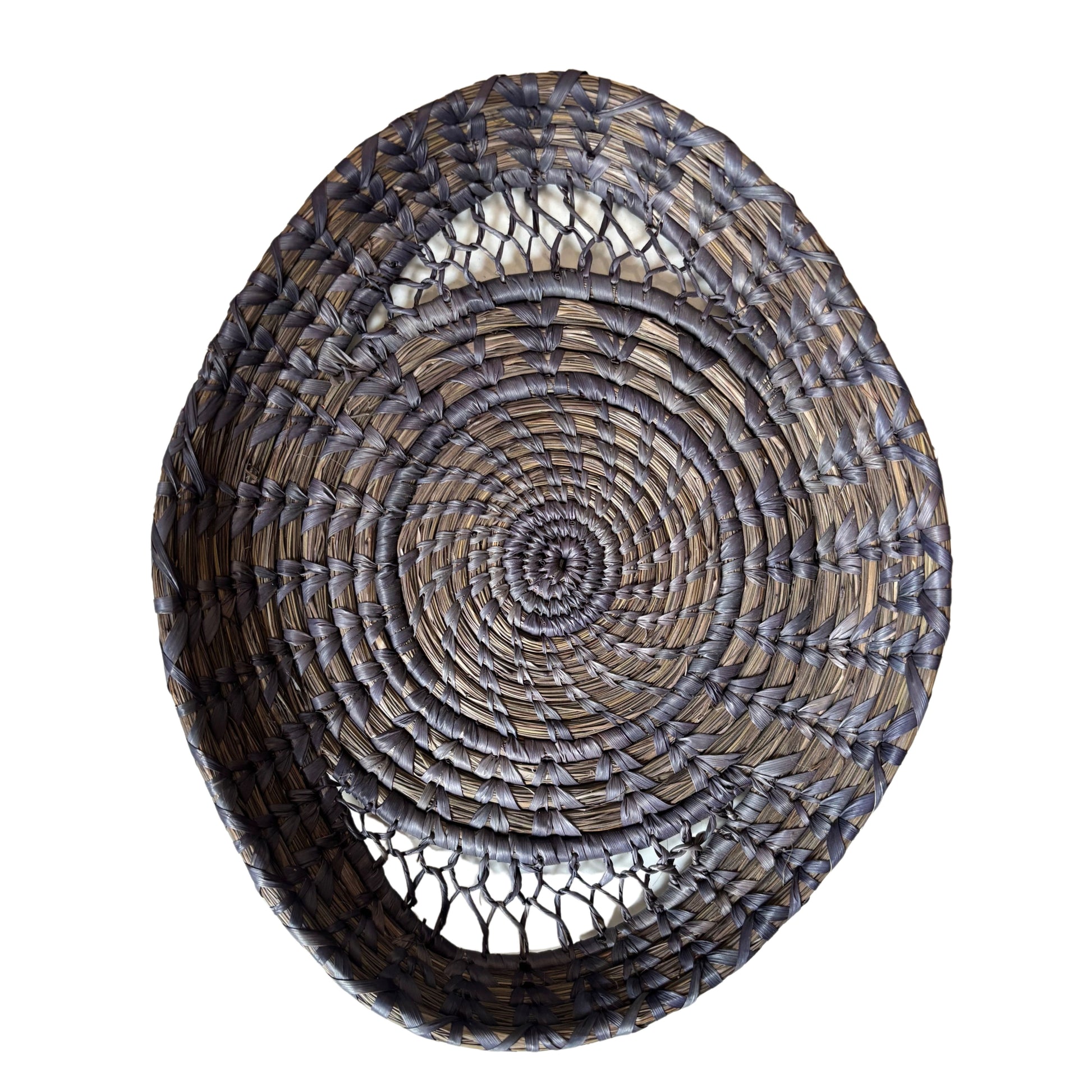 Top-down view of Indigo Sabai Fruit Basket handcrafted in coiled grass.
