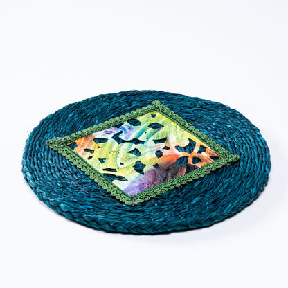 Flat lay of indigo sabai plate mat with colorful embroidered center

