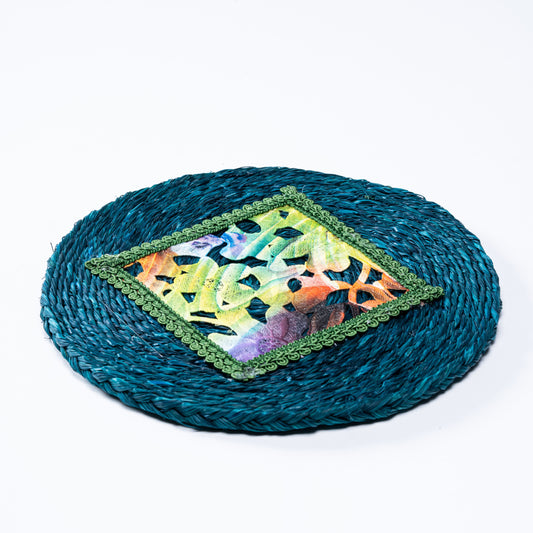 Flat lay of indigo sabai plate mat with colorful embroidered center

