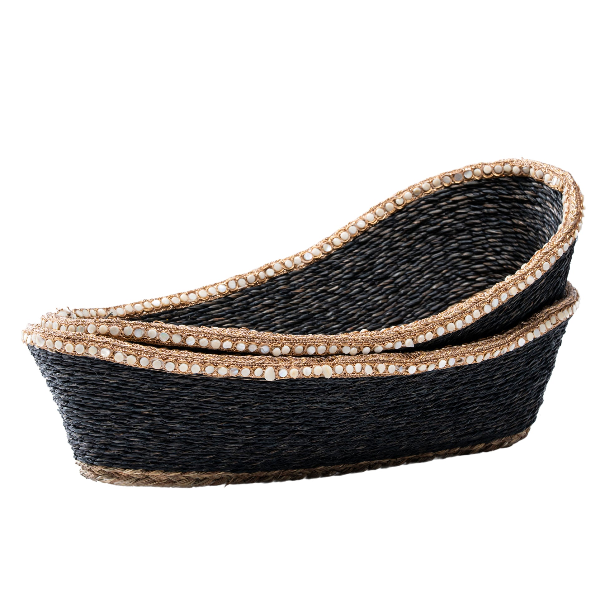 Macro shot of pearl beadwork on natural sabai grass basket edge

