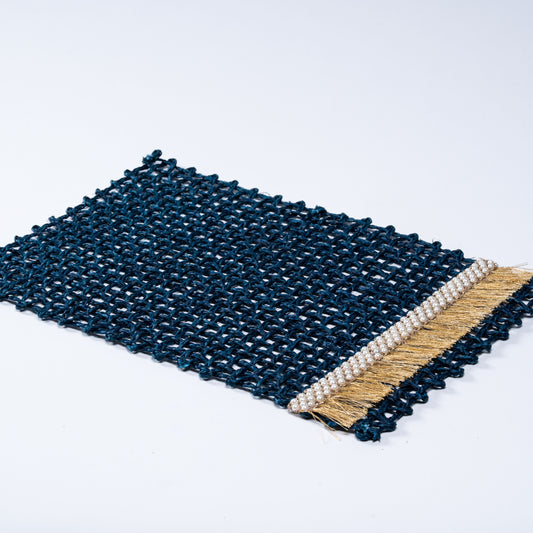 Close-up of Rectangle Blue Knots Mat showing intricate golden trim and pearl beadwork.

