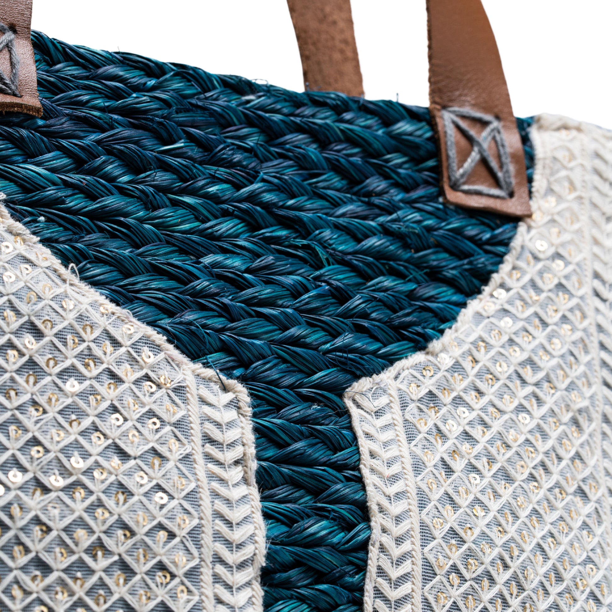 Zoomed-in view of sabai grass texture and embroidery stitches