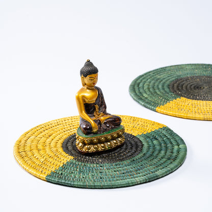 Pair of Tricolour Sabai Plate Mats styled with ceramic bowls for table setting.